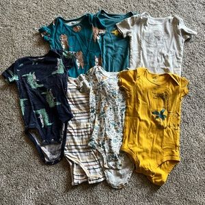 Seven 24 month Carter’s boys onesies